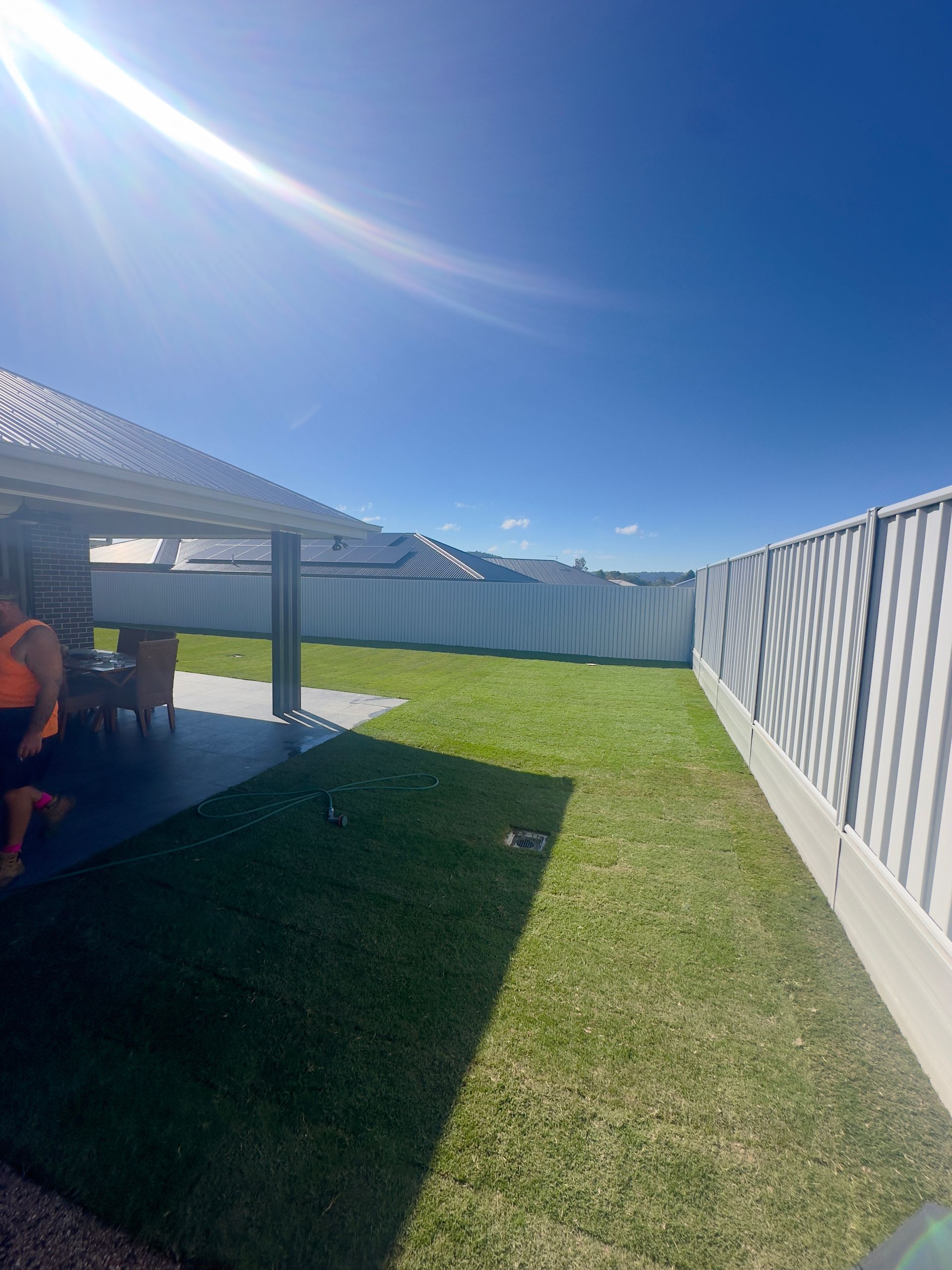 Lovey green lawn on the side of a house— Joe's Turf In Spring Creek, QLD