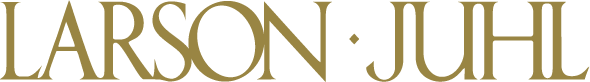 A close up of the word larson juhl on a white background
