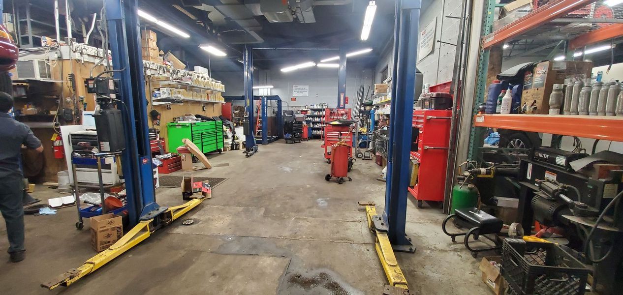 A garage with two lifts.