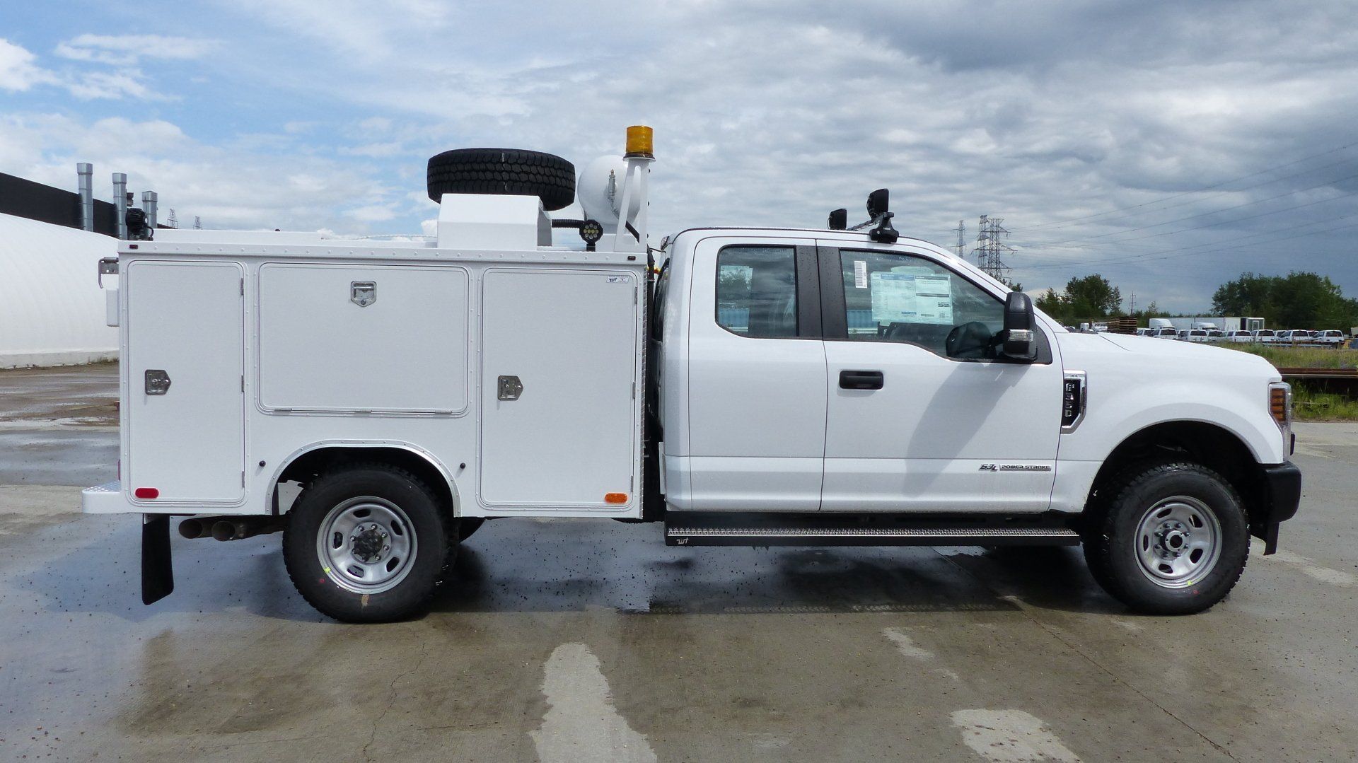 White mini truck with installed service body