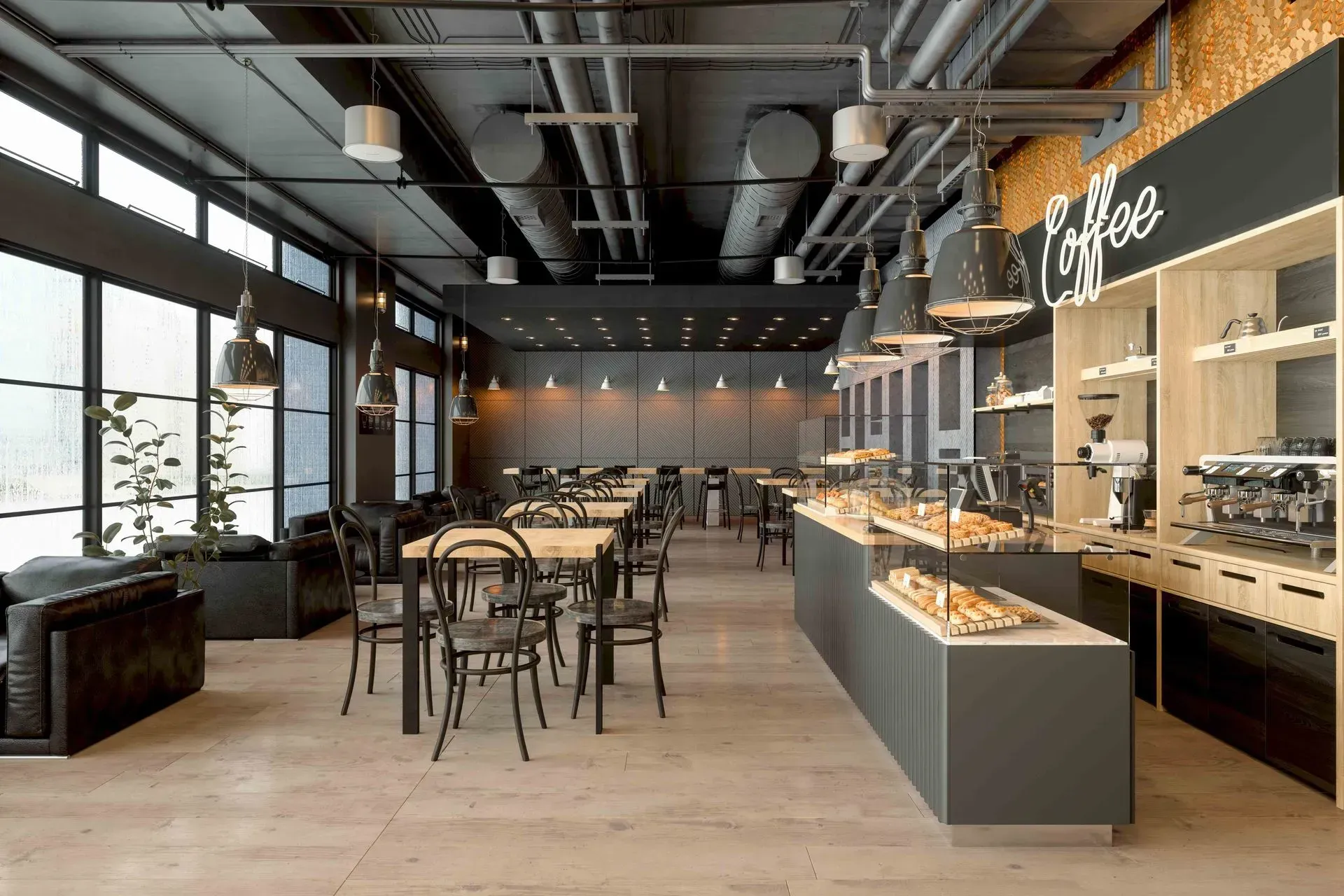Modern café interior with tables, counter, espresso machines, and large windows