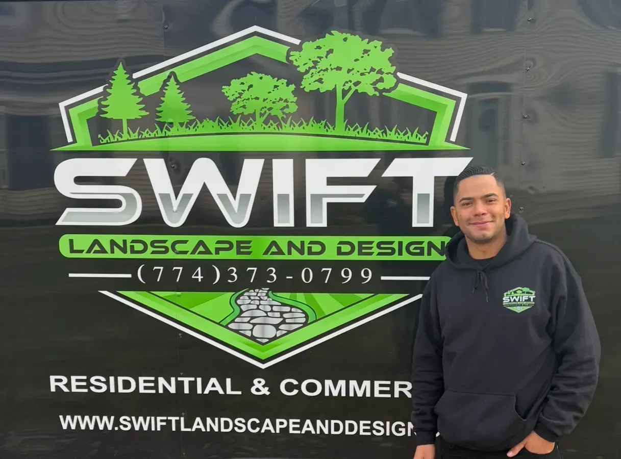 Swift Landscape and Design logo banner with green trees and a smiling man standing at right