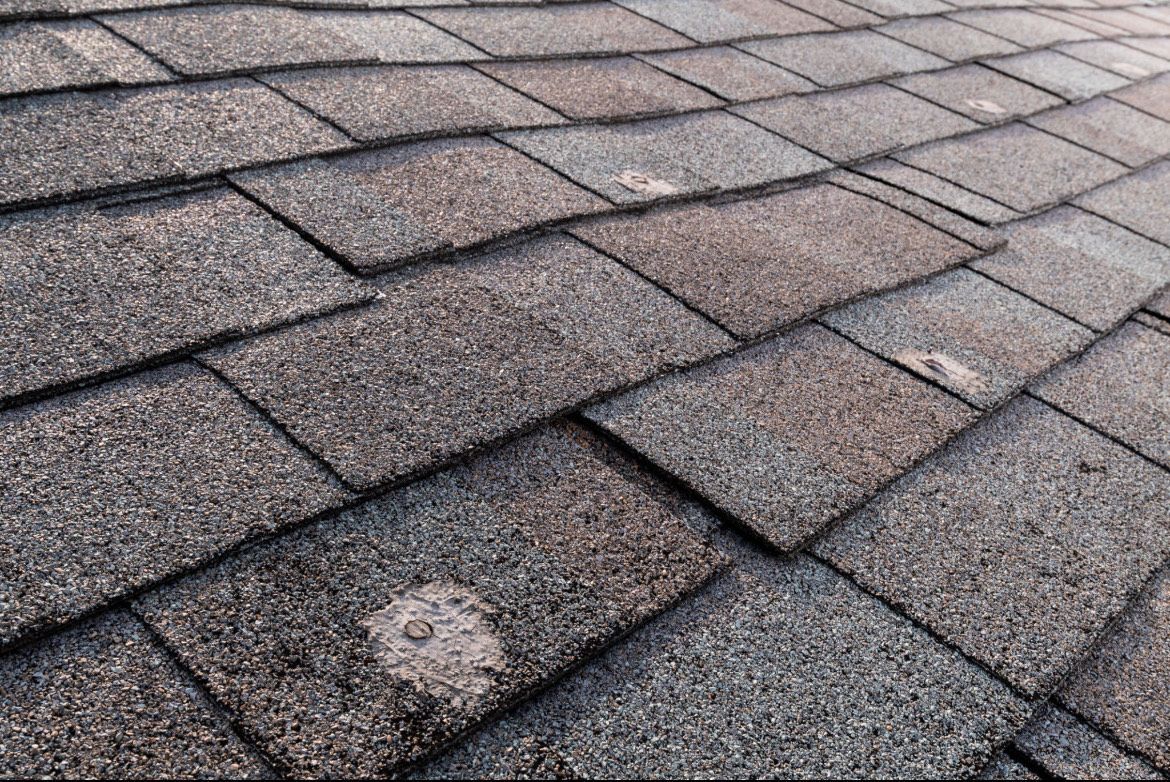 A Close up Of a Roof with A Lot of Shingles on It. A Close up Of a Roof with A Lot of Shingles on It.