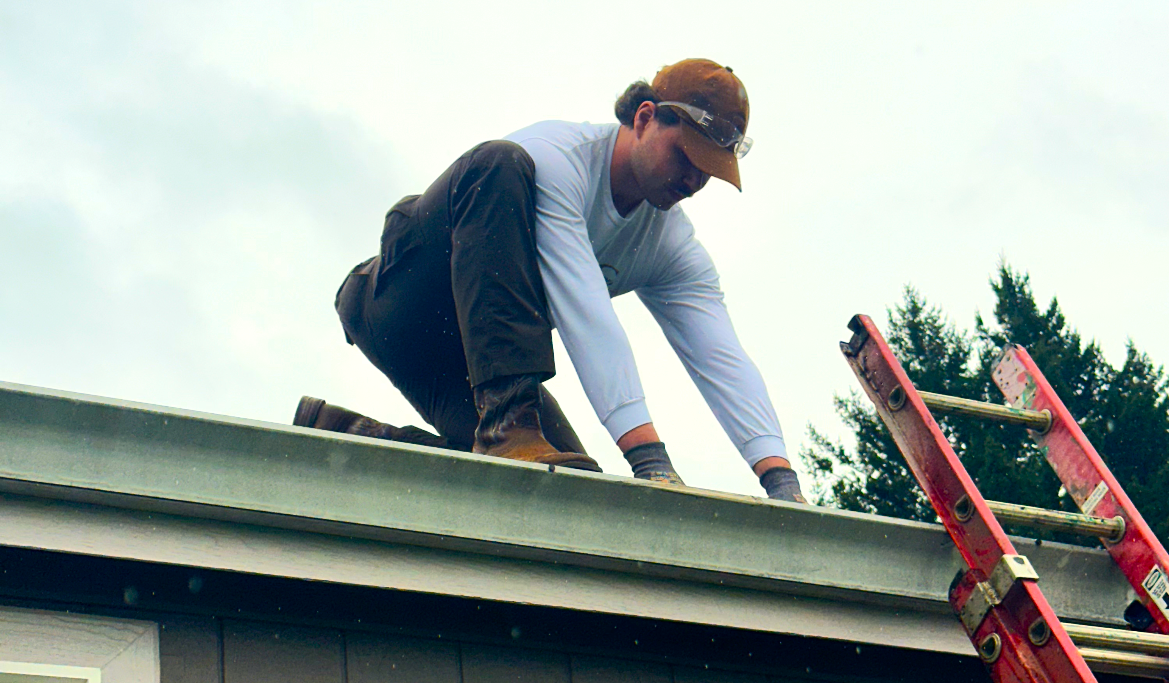 Man working on roof