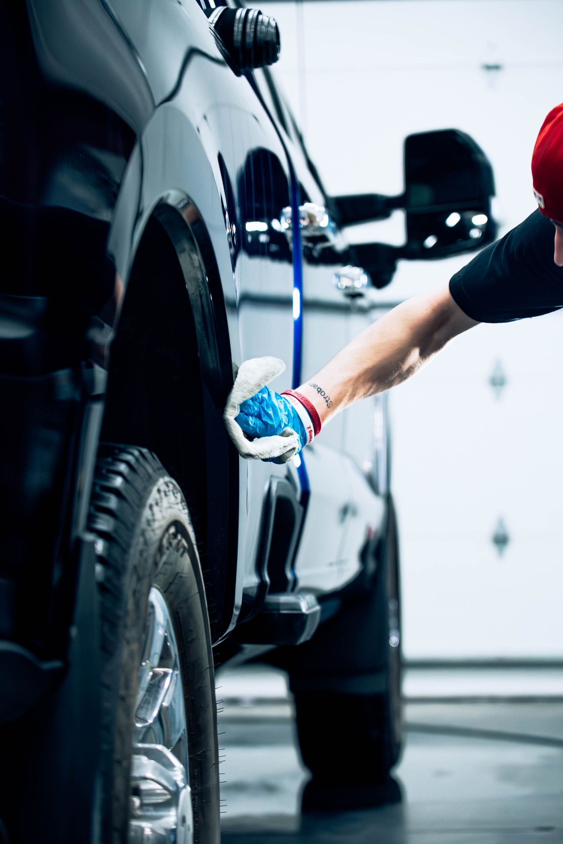Washing a coated truck at 719 Auto Customs