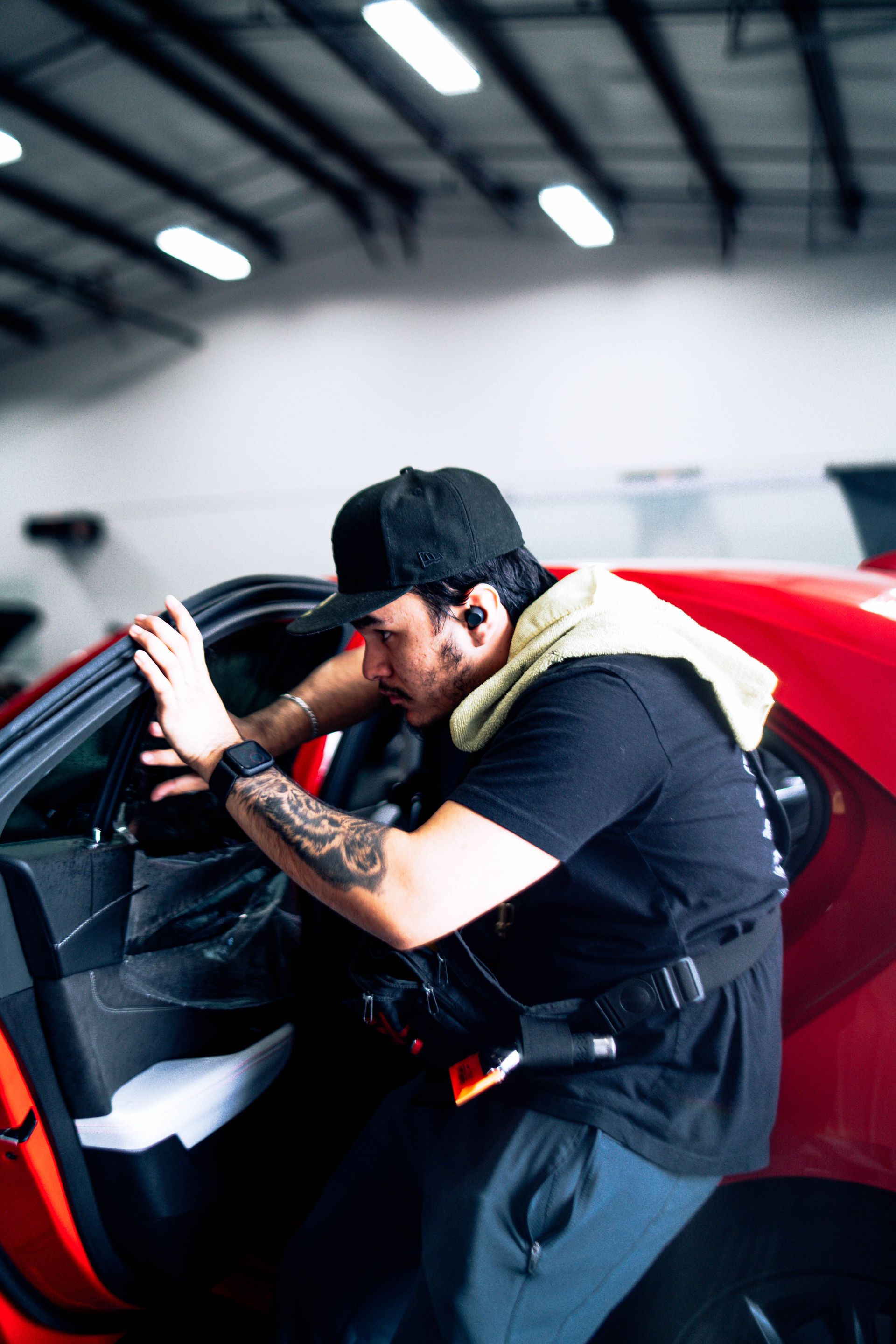 Window tint installed on a red sports car