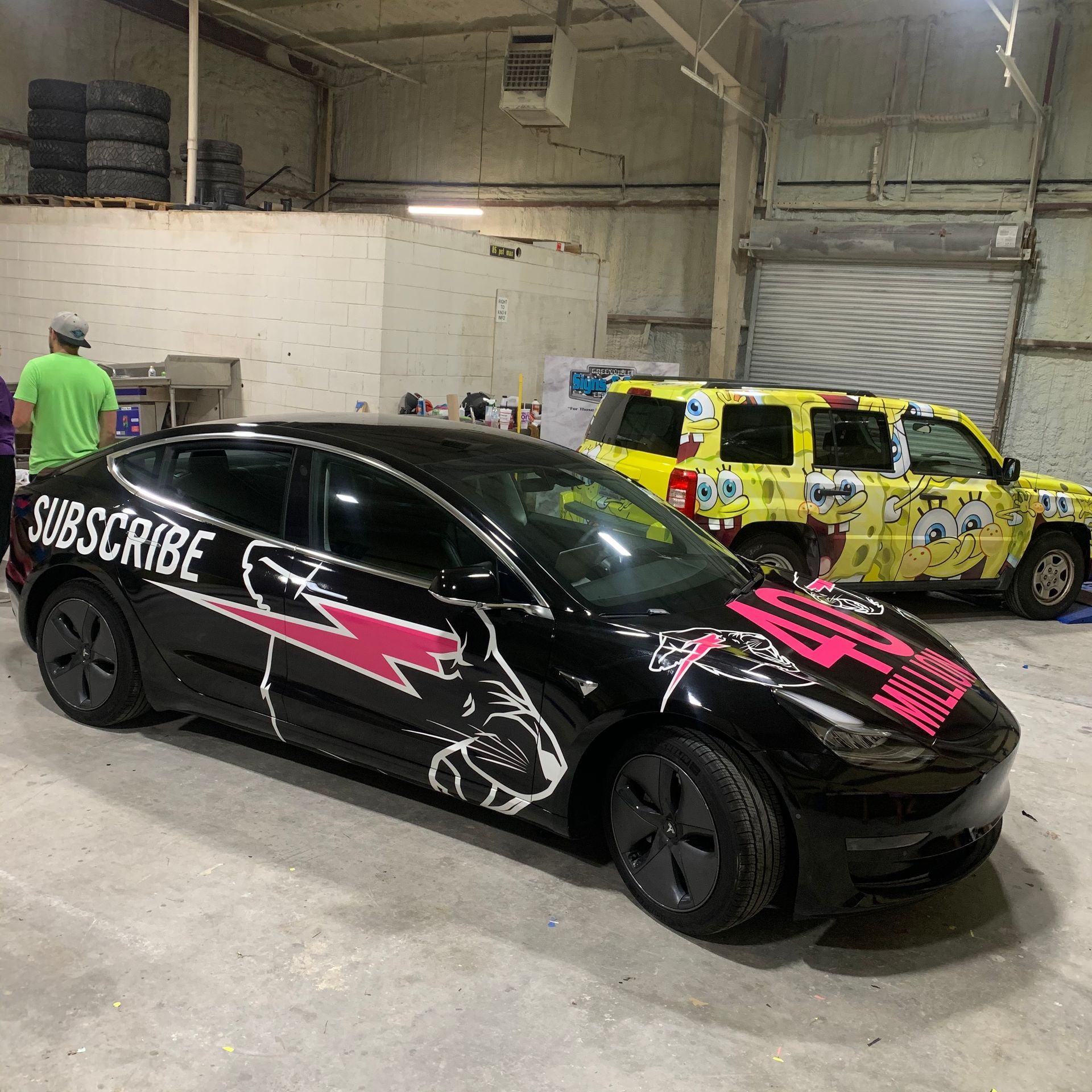 A black Tesla with custom