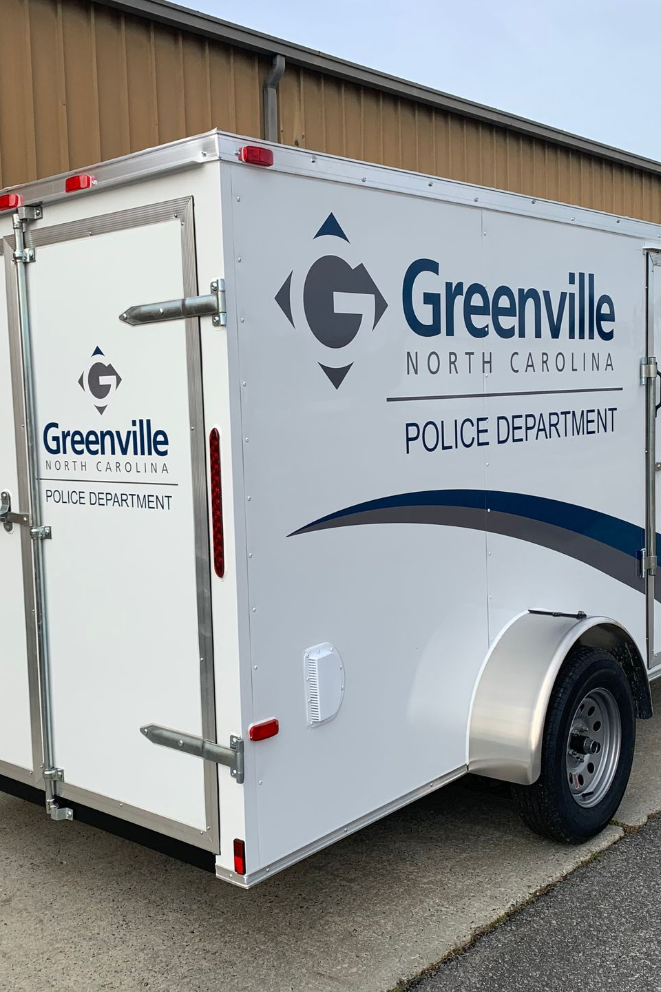 White trailer labeled