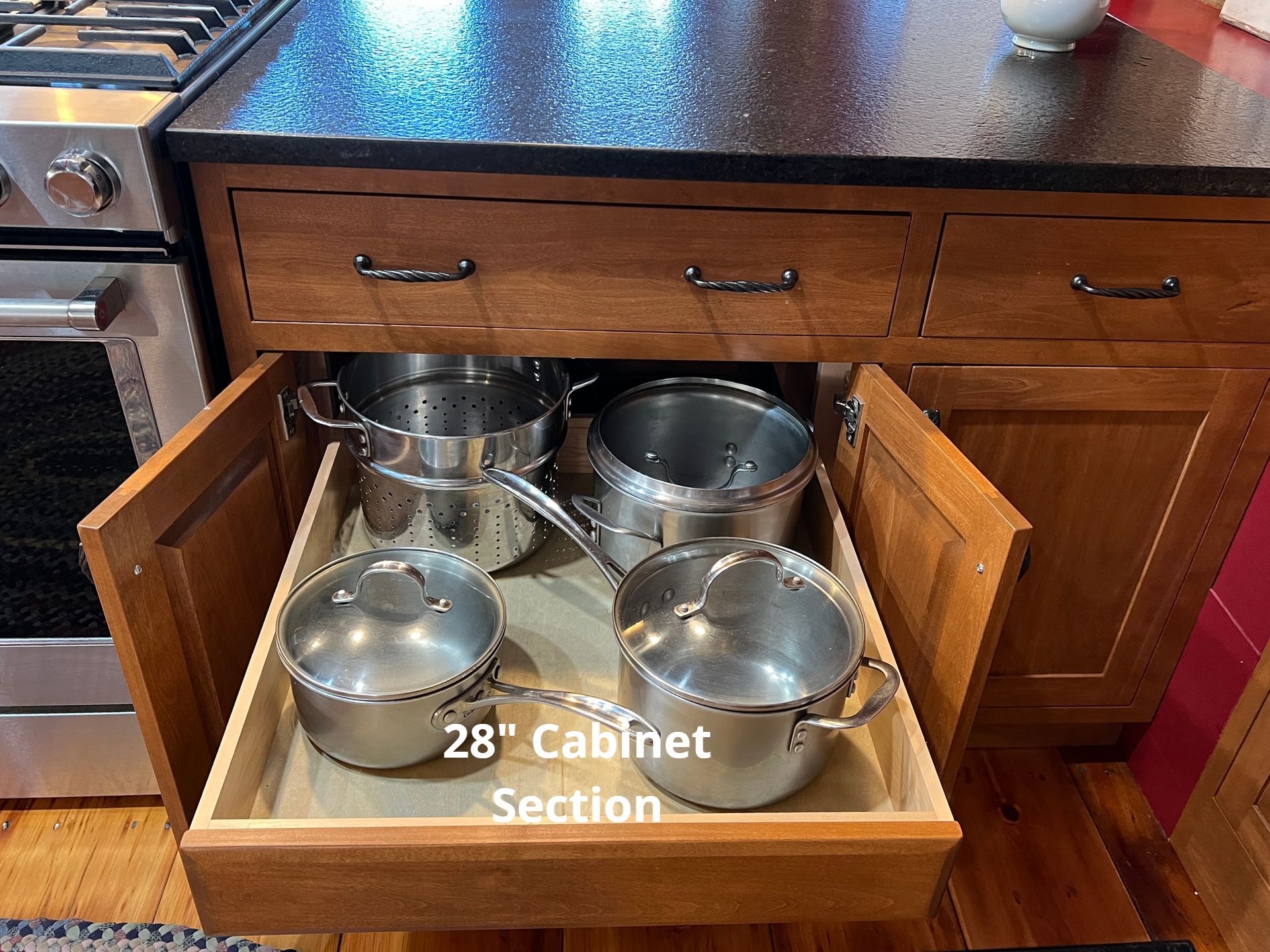 Kitchen Organizers | Slide out tray Storage | Taylor Made Cabinets Leominster MA.