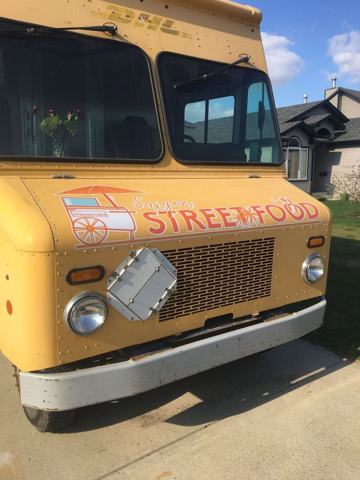 Vinyl graphic being applied to a truck