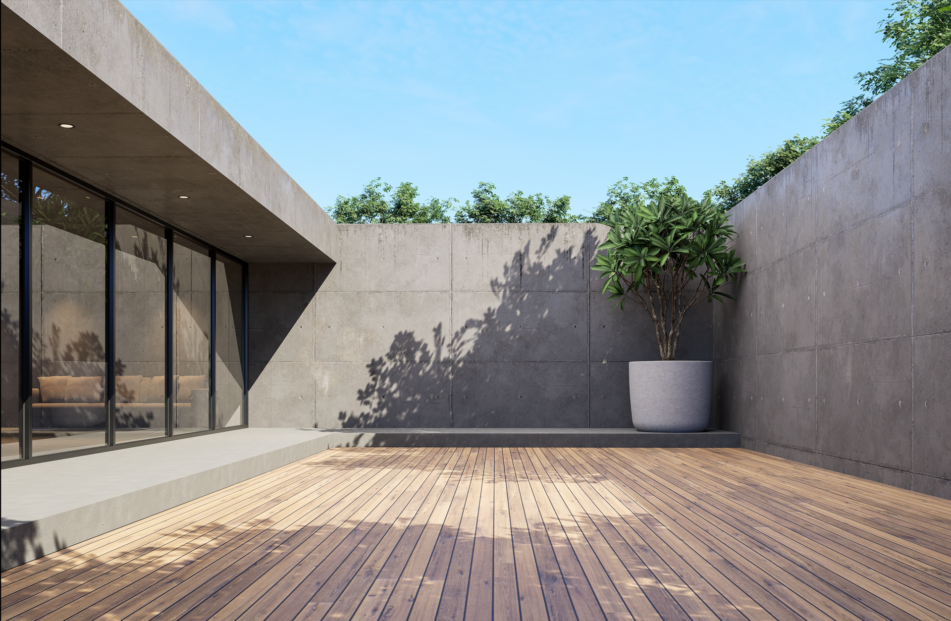 Person smoothing a curved concrete walkway beside a house during construction