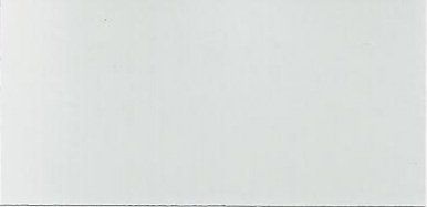 Mostly blank white surface with a faint gray edge on the left and bottom.