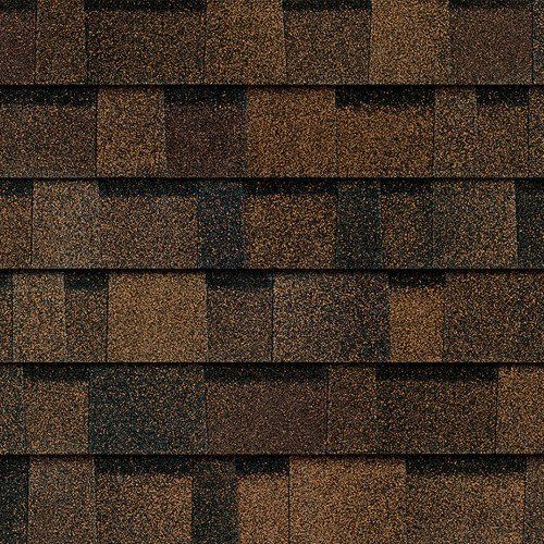 Brown shingle roof tiles in a close-up view