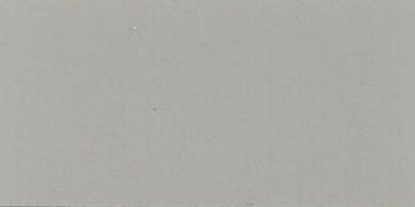 Blank light gray wall or surface with a few faint smudges.