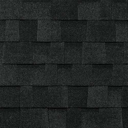 Dark gray roof shingles in a close-up pattern.
