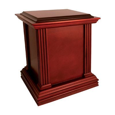 Red wooden podium with carved columns and a flat top on a white background