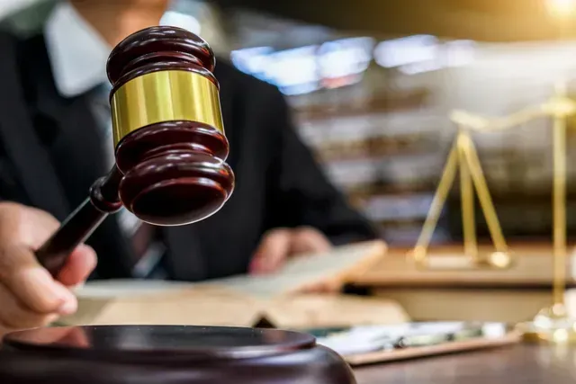A Judge Is Holding A Wooden Gavel — Pleasanton, CA — Thompson • Garcia Law