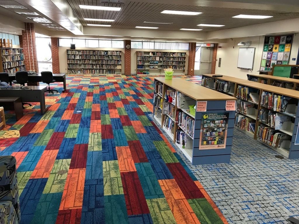 Public library interior with patterned commercial carpet tile