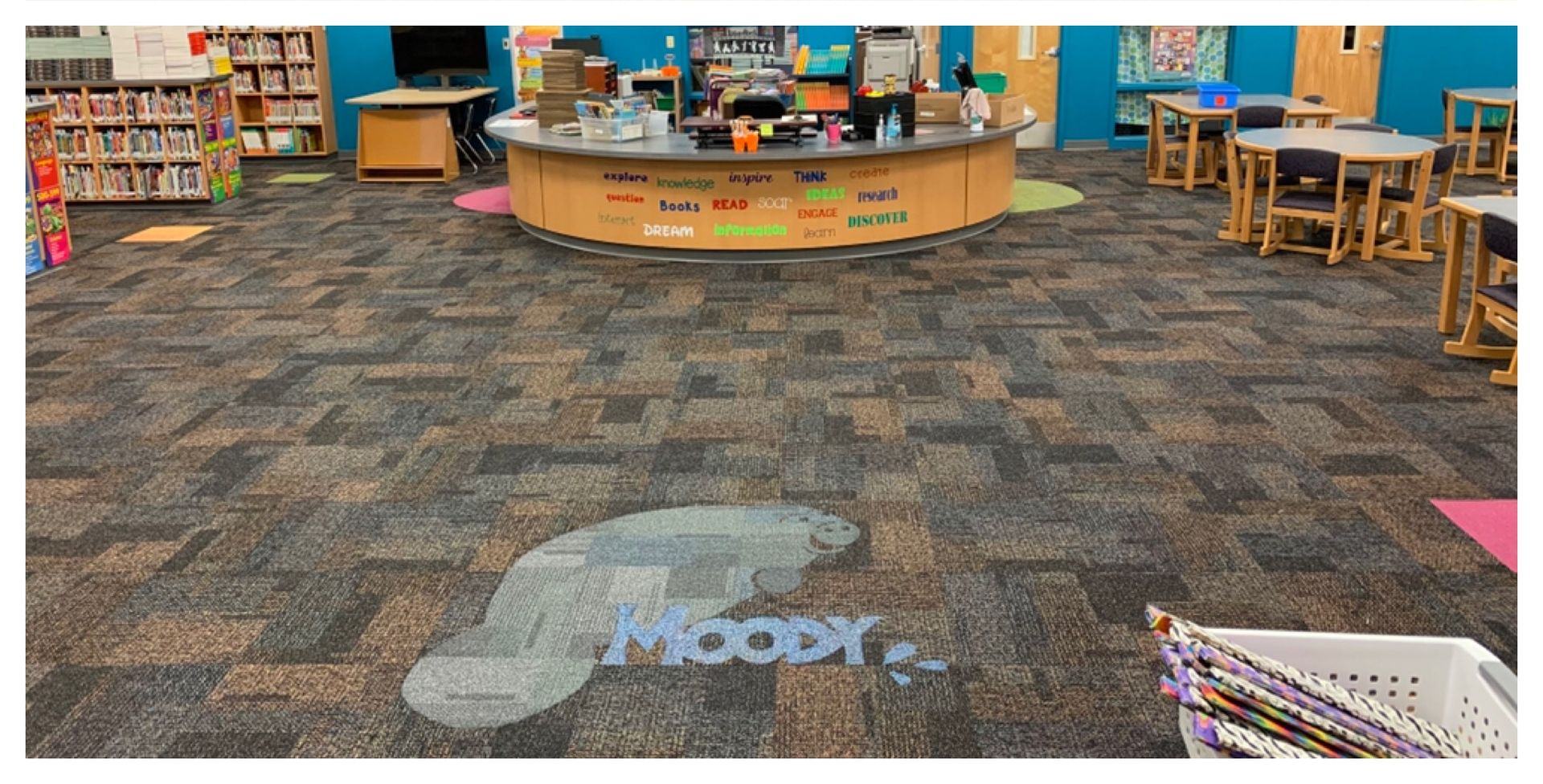 Custom moon inlay in commercial carpet flooring