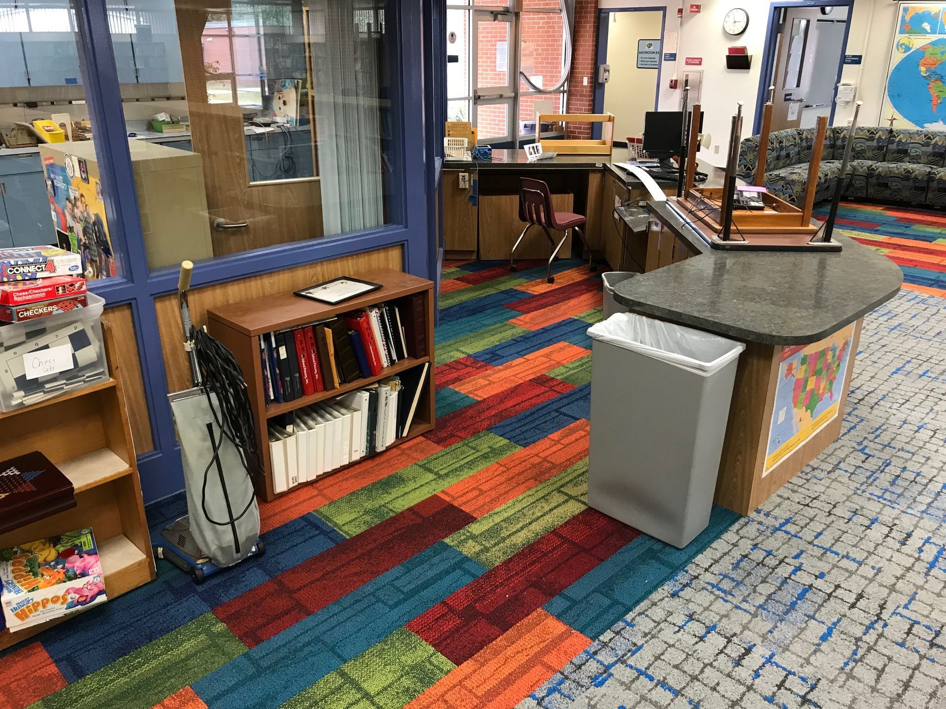 Library service desk with commercial carpet flooring