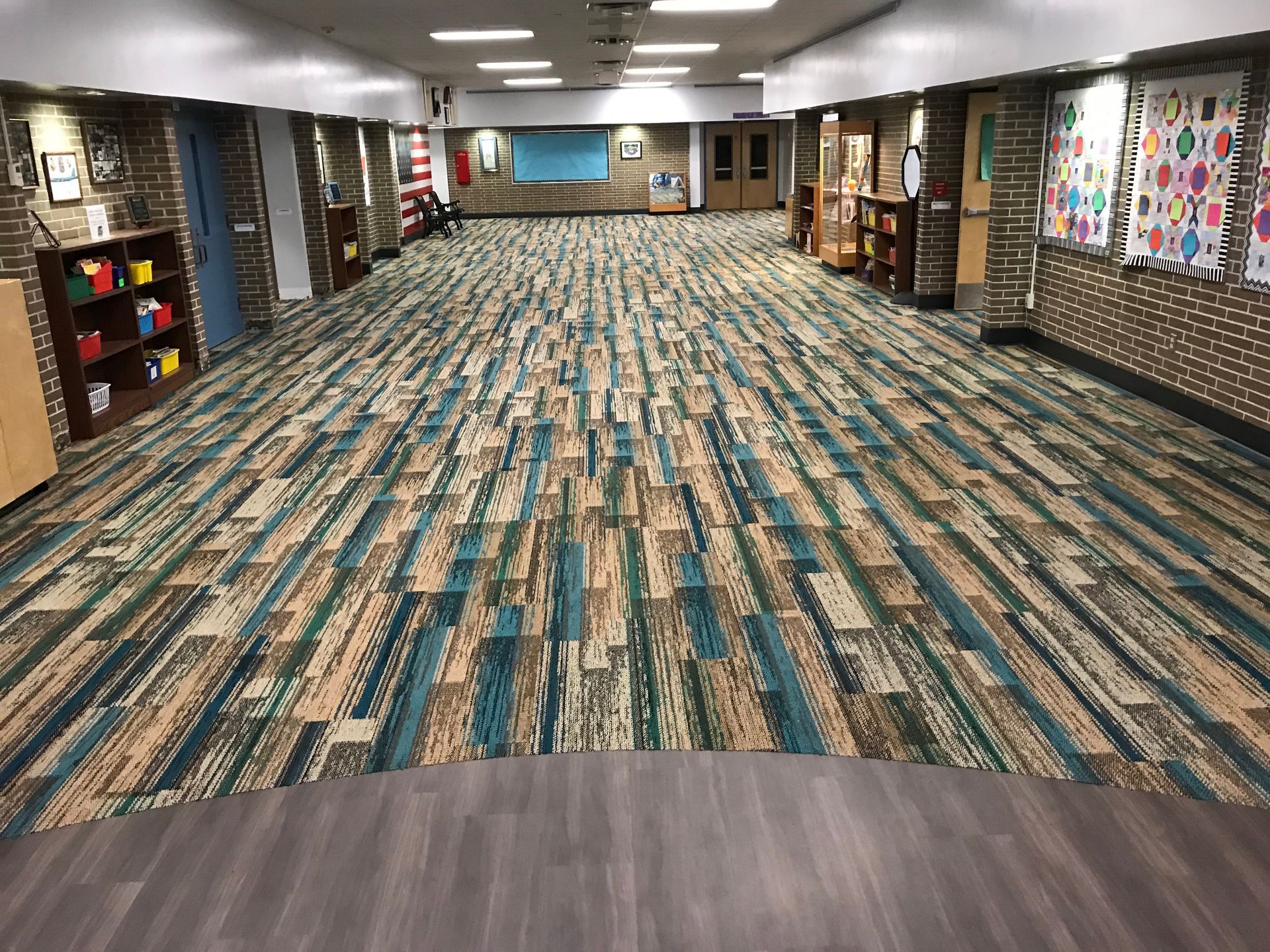 Patterned commercial carpet flooring in a school hallway