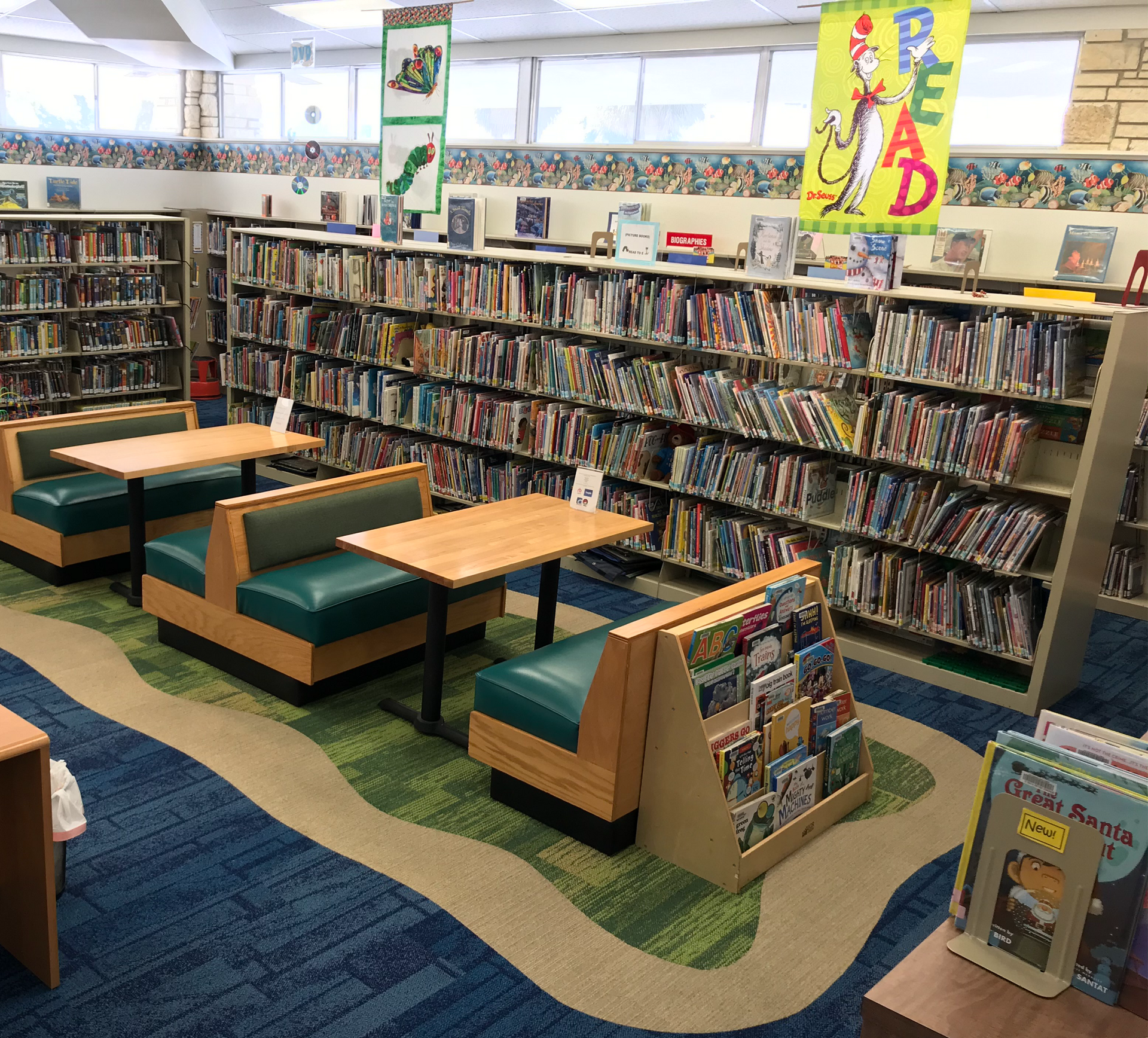 Library seating area with commercial carpet flooring