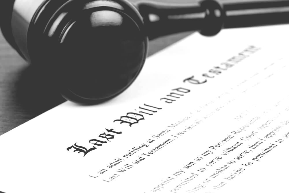A Wooden Gavel Placed On the Table — Farrell Lusher Solicitors In Wagga Wagga, NSW