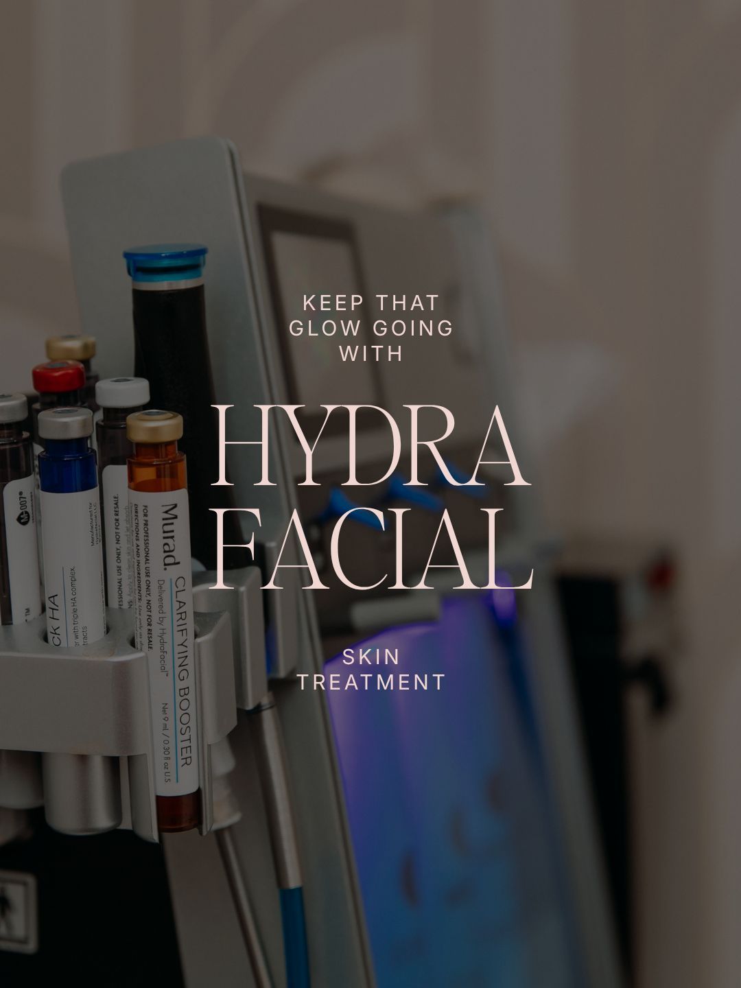 Hydra facial treatment setup with skincare tools and bottles on a tray in a clinic setting