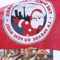 A red flag with a picture of santa claus on it