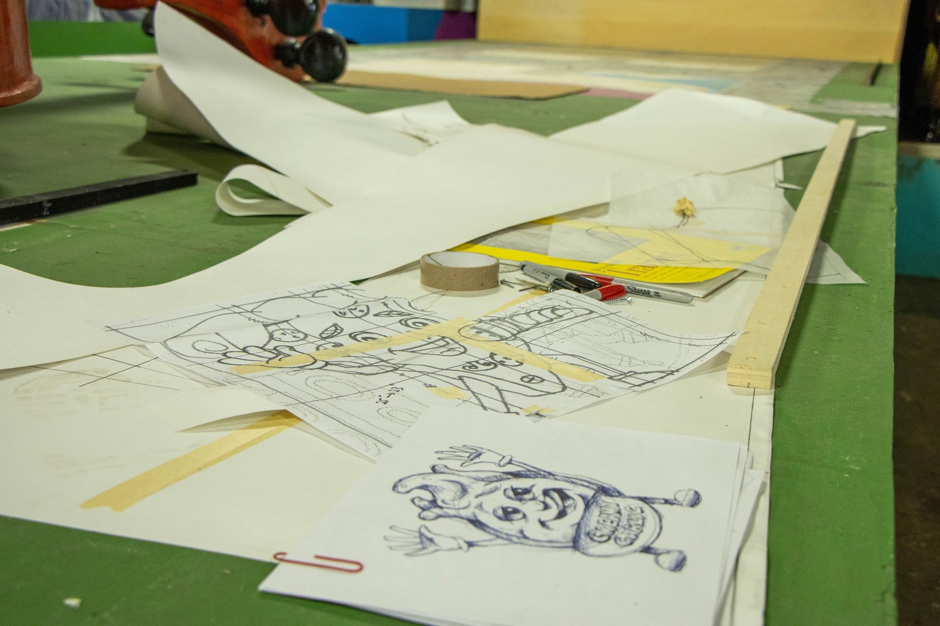 A piece of paper with a drawing of a dragon on it