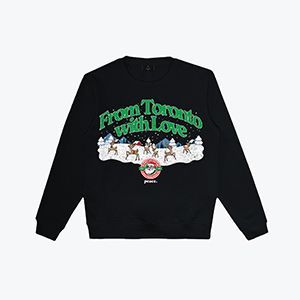 A black sweatshirt with a christmas scene on it.