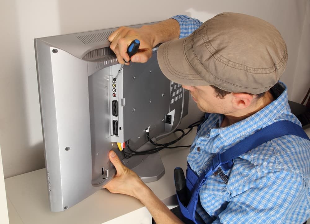 Electrician Repairing TV - Antenna Services in West Gosford, NSW