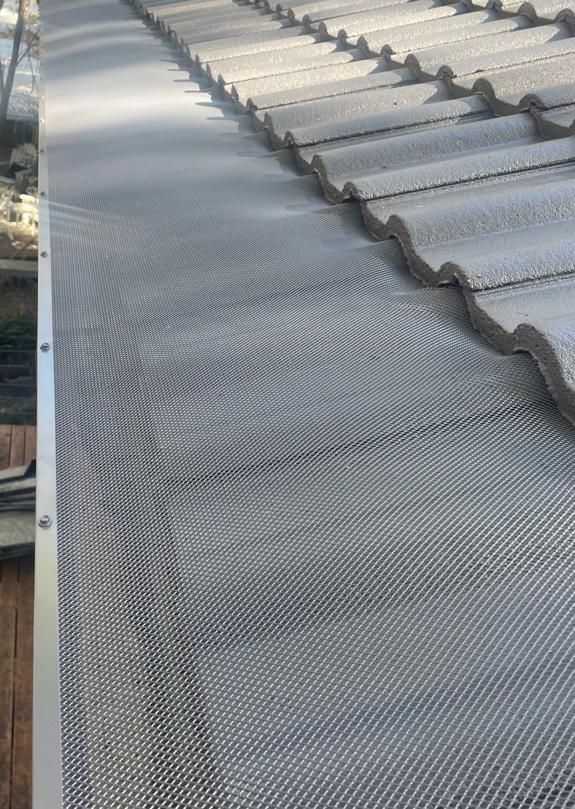 A close up of a gutter on a roof. — Platinum Pride Roofing In Wyoming, NSW