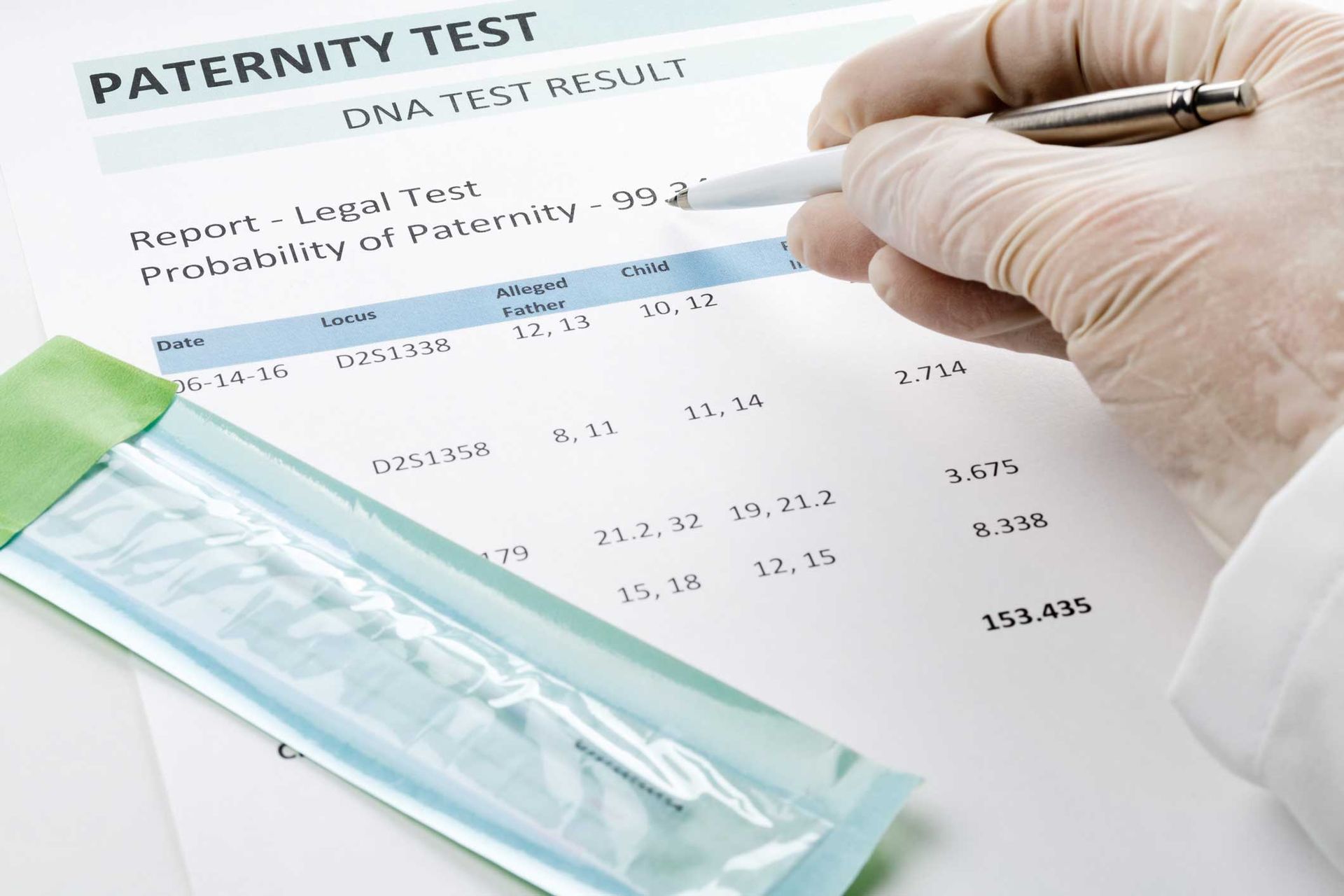 A gloved hand pointing to a paternity test result document with a swab. A gloved hand pointing to a paternity test result document with a swab.
