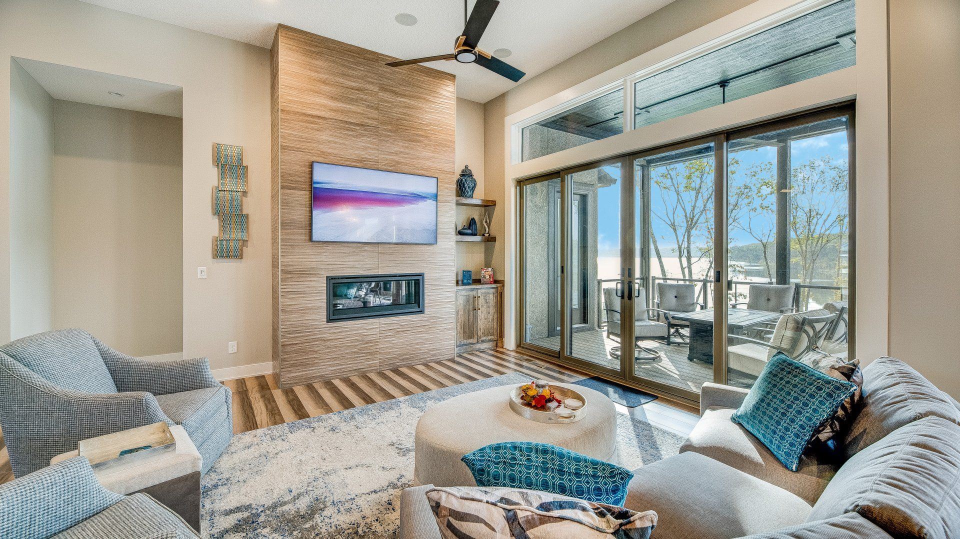 A living room filled with furniture and a flat screen tv.