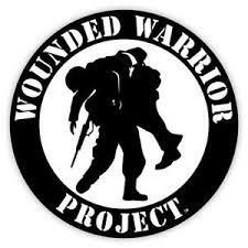 Silhouette of a soldier carrying another, encircled by