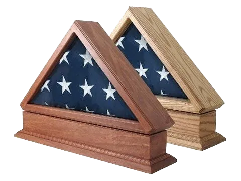 Two wooden flag display cases, one mahogany and one oak, each holding a folded American flag.