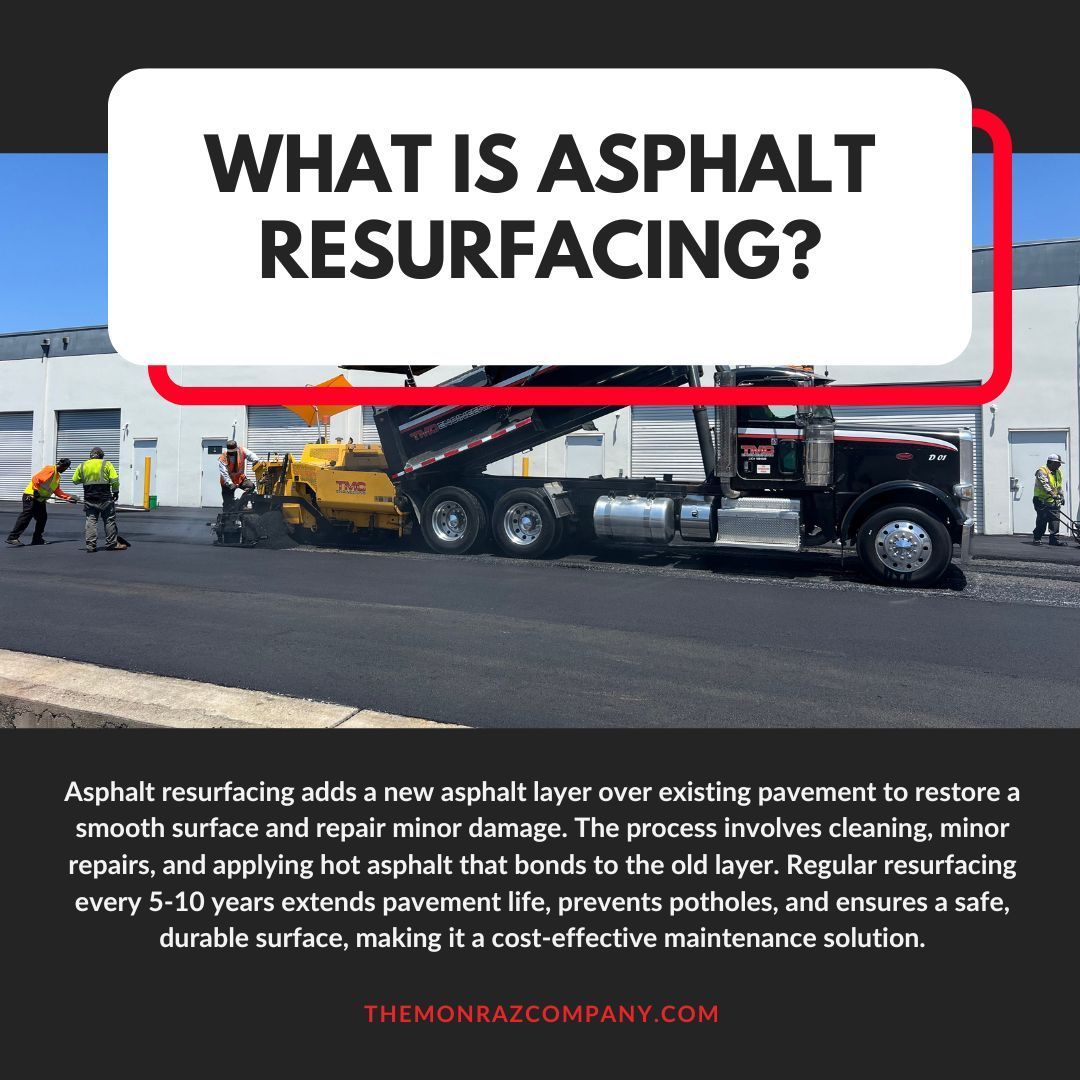 A truck is being used to resurface a road.