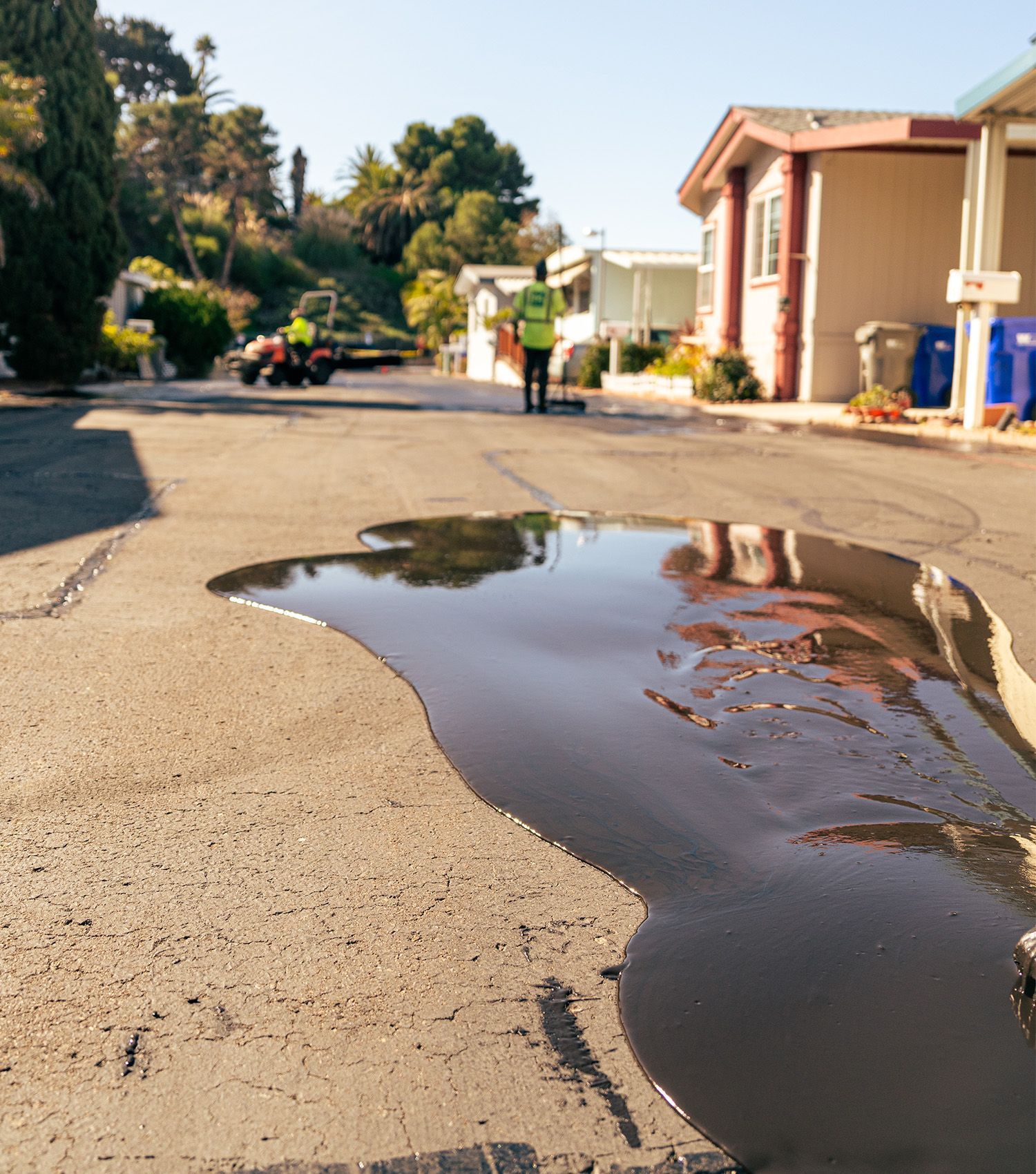Sealing cracked asphalt street