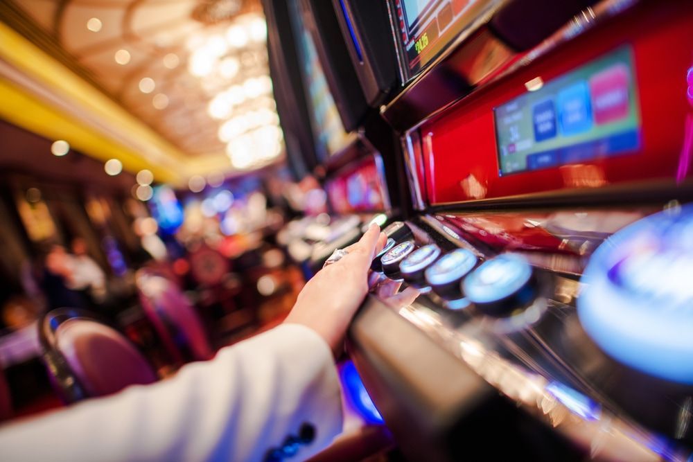 Woman Playing Video Slot In The Casino — Gaming Machine Locksmiths on the Sunshine Coast, QLD