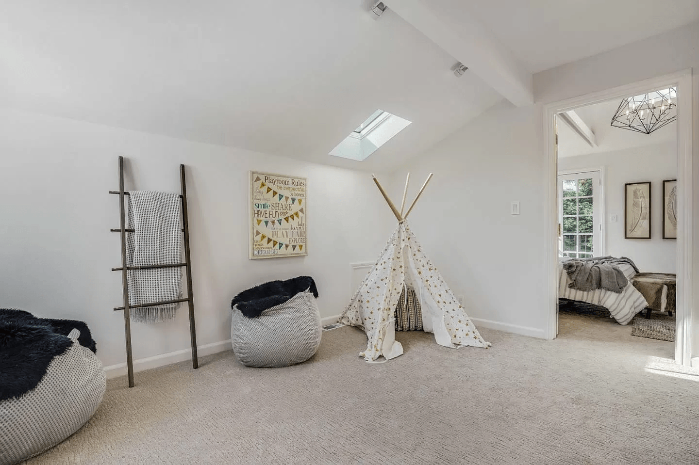 There is a teepee in the middle of the room.