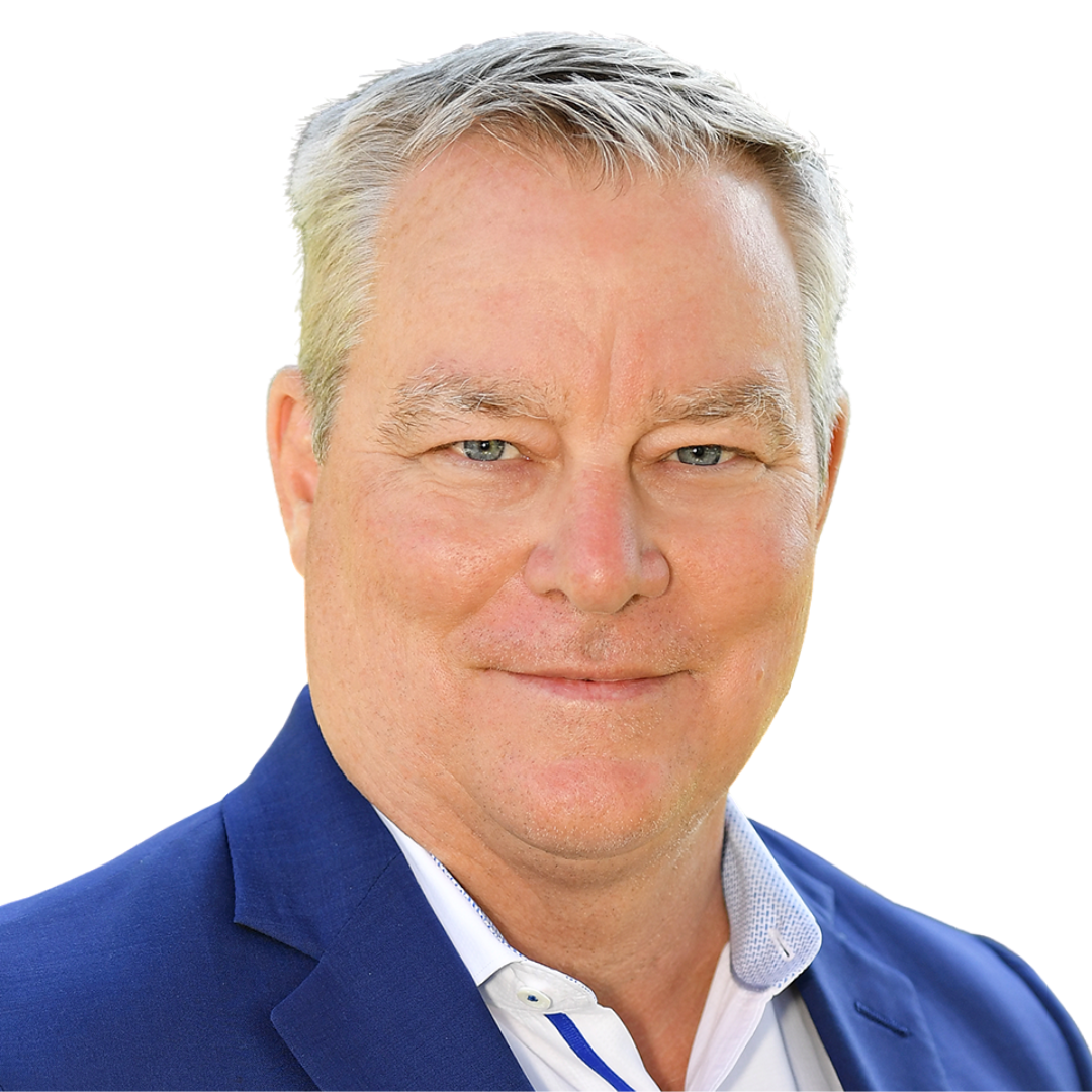 A man in a blue suit and white shirt is smiling for the camera