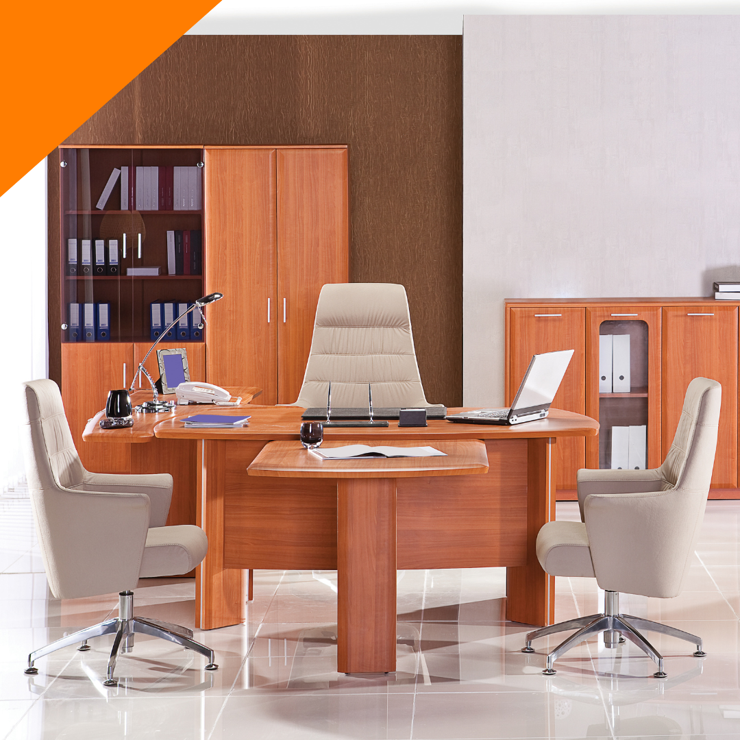 An office with a desk and chairs with a laptop on it