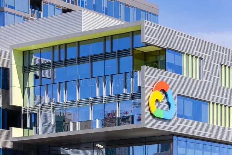 Google Cloud office building with colorful logo on a modern glass facade