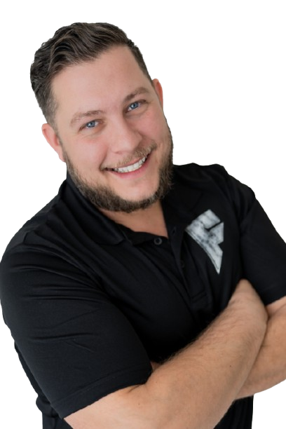 Smiling person in a black shirt with arms crossed against a white background