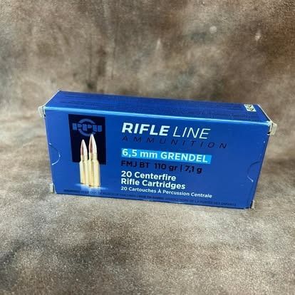 Box of 6.5mm Grendel rifle cartridges, blue and white, with bullet image.