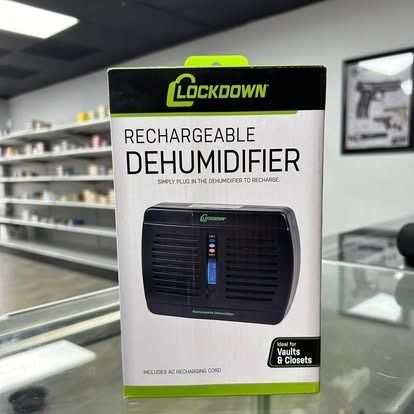 Lockdown rechargeable dehumidifier box on a glass shelf in a store.