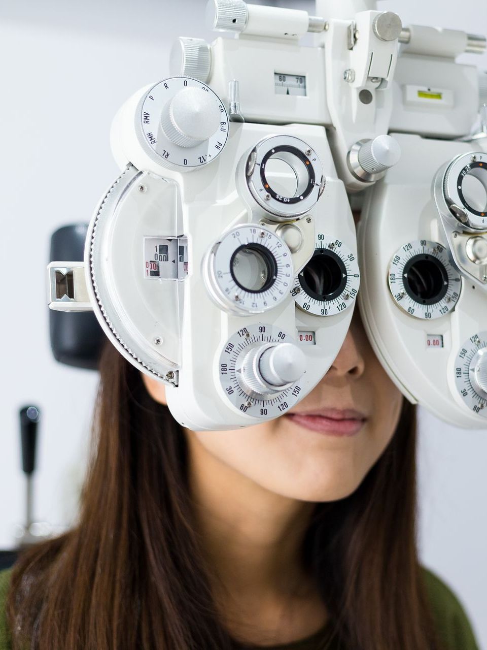 woman doing eye test in office