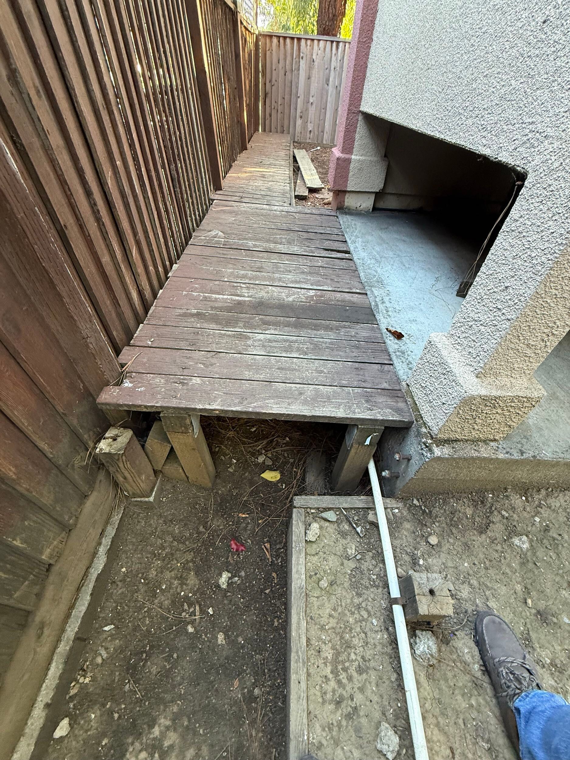 Deck renovation project featuring composite decking installation, upgraded stair system, reinforced structure, and modern outdoor finishes. Exterior remodel completed by Dream Build Services, specializing in deck construction, deck replacement, outdoor living spaces, and residential home improvements in the Bay Area.