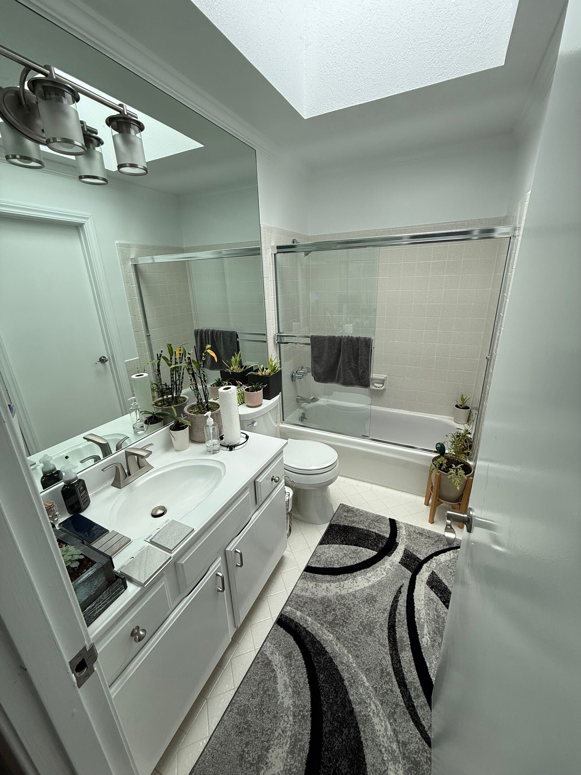 Complete bathroom remodeling transformation featuring a modern walk-in shower with frameless glass enclosure, large-format porcelain wall tile, custom shower niche, luxury rainfall shower system, floating-style vanity with quartz countertop, LED medicine cabinet, brushed gold fixtures, premium porcelain flooring, contemporary lighting, and upgraded plumbing fixtures. This full bathroom renovation replaced an outdated bathtub with a spacious walk-in shower, maximizing functionality, accessibility, and modern design while increasing home value.
Dream Build Services specializes in custom bathroom remodeling, bathroom renovations, shower conversions, tub-to-shower replacements, vanity installations, tile installation, flooring, lighting upgrades, plumbing fixtures, and complete home remodeling throughout the San Francisco Bay Area.